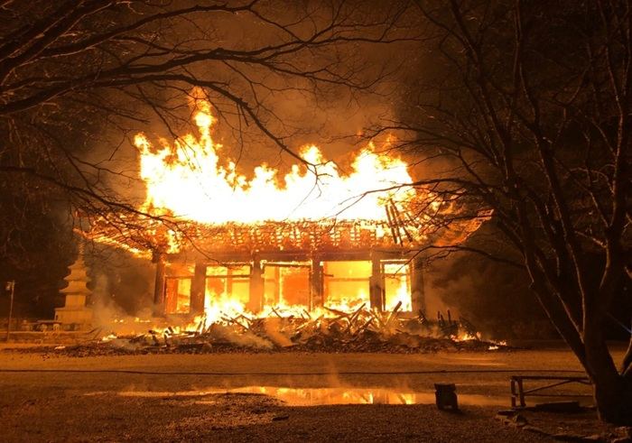Woman Arrested in Buddhist Monastery Fire, Faces Arson and Hate Crime Charges